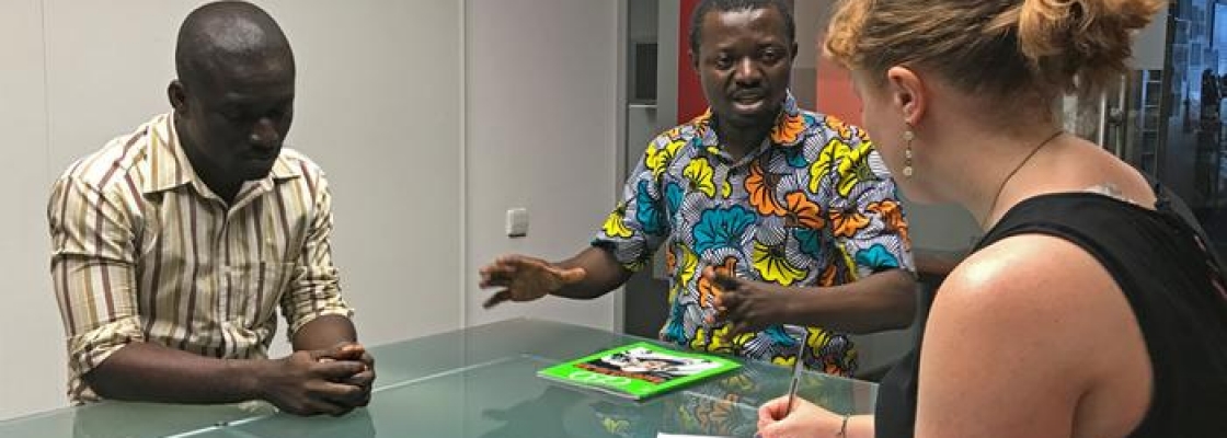 Derek Sarfo-Yiadom (left) and Kofi Sarpong Adu-Manu discuss their research as part of the DEMIS program