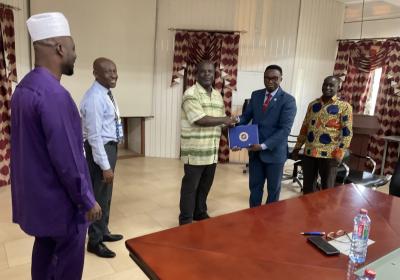 Prof. William Koomson, Vice Chancellor of VVU Left and Prof. Charles Tortor Director of Food Research Institute of CSIR Right In a Hand Shake After Signing The MOU